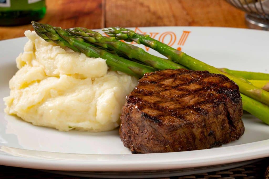 Close up of Steak and Mashed Potatoes with Asparagus