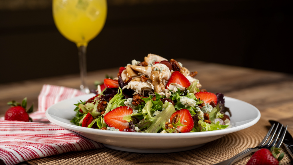 Strawberry chicken salad with blue cheese and candied pecans.