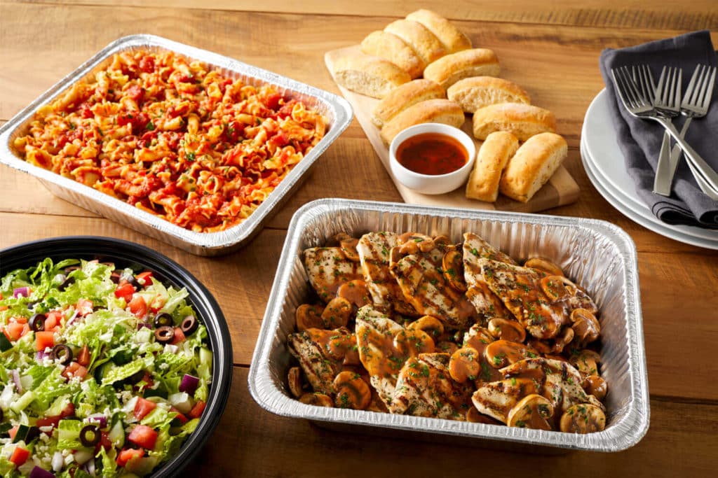 A photo of Bravo's Chicken Marsala, Pasta, salad, and rolls