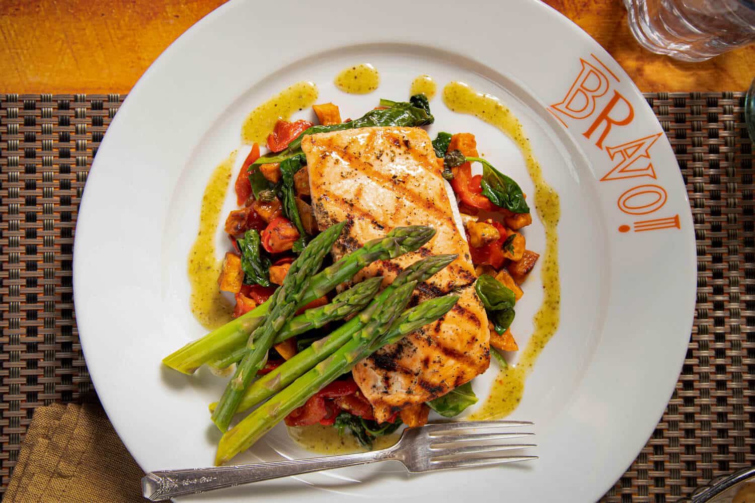 Closeup of Bravo's grilled salmon fresca in a plate